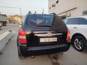 vaz qapi: Hyundai Tucson: 2 l | 2007 il Ofrouder/SUV — 7