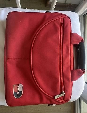 msi notebook: Brinch noutbuk çantası – qırmızı rəng ölçü 30 sm - Kompakt və yüngül — 1