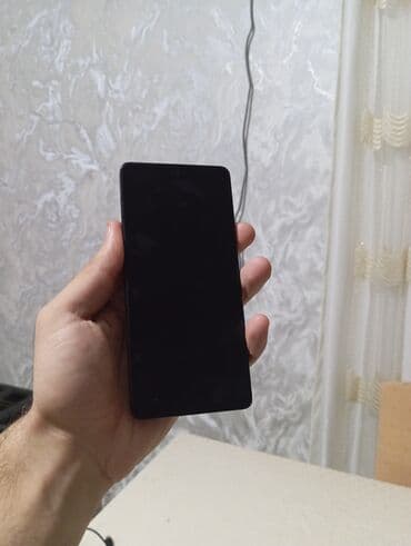 сотовый телефон fly ts113 черный: Redmi smartfon - Rəng: qara, parlaq arxa panel - Kamera: arxada çoxlu — 9