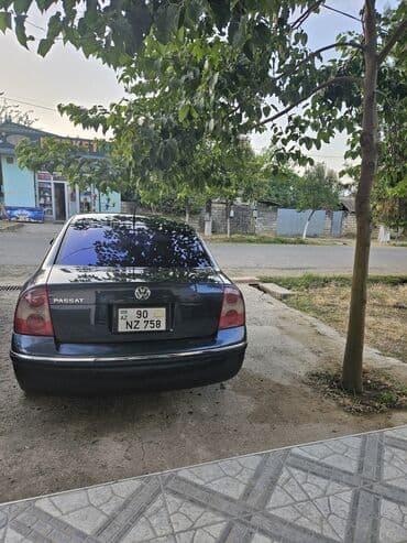 Информатика: Volkswagen Passat: 1.8 л | 2004 г. Седан — 4