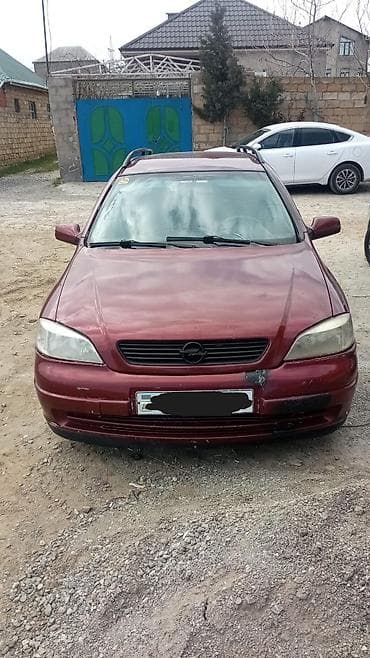 uaz diski: Opel Astra Caravan (Universal) – bordo rəng, geniş və praktik ailə — 2