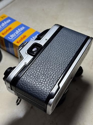 instax mini 12 en ucuz: 1979-cu il Yaponiya istehsalı. Olympus OM 10 35 mm film ilə işləyən — 3