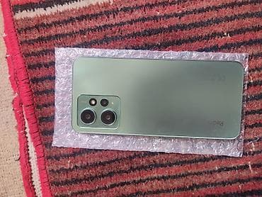 xarab telefonlar: Xiaomi Redmi Note 12 (yaşıl rəng) - 6.67" AMOLED ekran, mərkəzi — 2