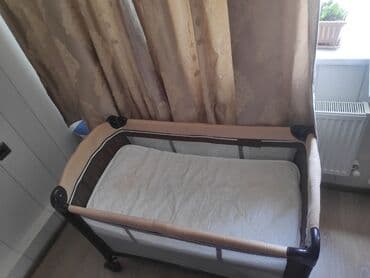 uwaq ucun manej: Bu, körpələr üçün nəzərdə tutulmuş, tünd qəhvəyi və bej rənglərdə olan — 3