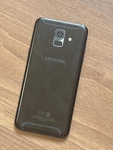 iphone 12 pro max sekilleri: Samsung Galaxy A6, rəng - Qara, Sensor, Barmaq izi, İki sim kartlı — 1