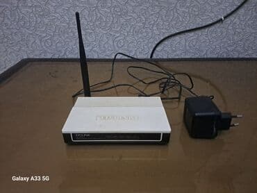 Информатика: TP-Link simsiz router Xüsusiyyətlər: - TP-Link marka Wi‑Fi router - 1 — 1