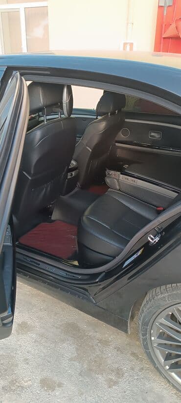 Audi: BMW 7 series: 4.8 л | 2006 г. Седан — 1