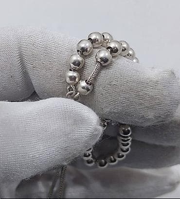 bijuteryalar: 925 gümüş təsbeh.33 dənəli.Zənciri gümüşdür.Çəki 16 qr.Uzunlugu 18 — 3