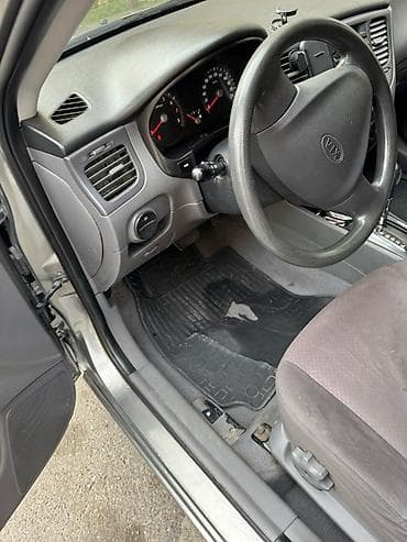 kia rio masin: Kia Rio: 1.4 l | 2010 il Sedan — 7