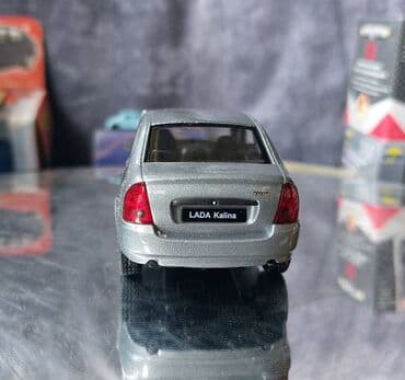 metbex tavan modelleri: Коллекционная модель Lada Kalina VAZ1118 silver 2004 Welly Scale — 11