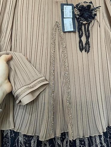 Qadın dəsti – plissəli uzun ətək 170 azn alınıb,100 azn