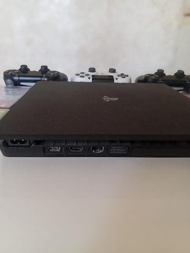 PlayStation 4 Slim oyun konsolu – tam set Dəst: - PS4 Slim (qara) — 2