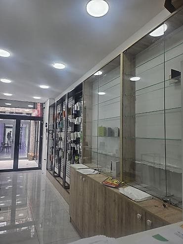 divarda televizor yeri: İcarəyə verilir – vitrinli ticarət sahəsi - Təyinat: aksesuar/mobil — 2