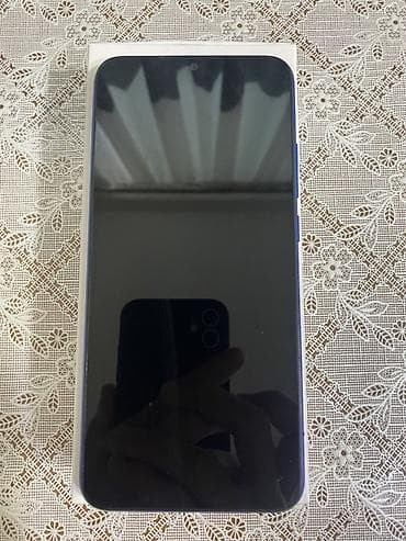 Xiaomi Redmi (mavi rəng) - Ekran: təxminən 6” tam ekran, ön kamera