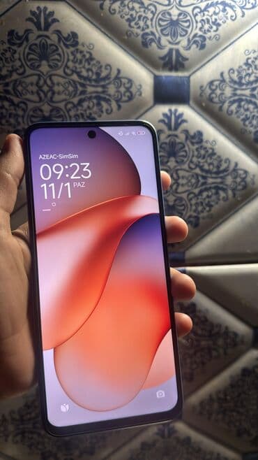 Asia: Redmi smartfon – mavi rəng Xüsusiyyətlər: - Arxa tərəfdə 3 kameralı — 2