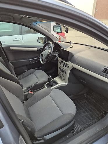 aston martin rapide 6 v12: Opel Astra: 1.3 l | 2008 il Universal — 7