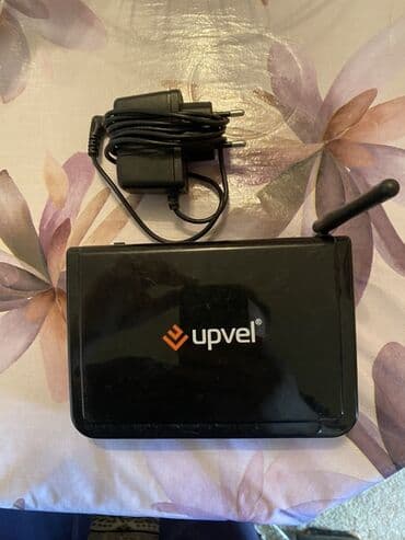 tp link modem qiymeti: Upvel şirkətindən olan qara rəngli router. Evdə və ya ofisdə internetə — 1