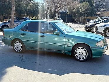 015 fara: Mercedes-Benz C-Class: 2.4 l | 1998 il Sedan — 8
