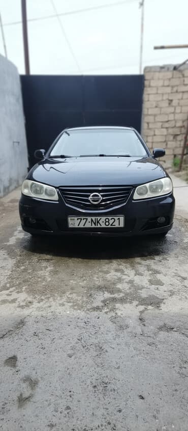 Nissan Sunny: 1.6 l | 2010 il Sedan