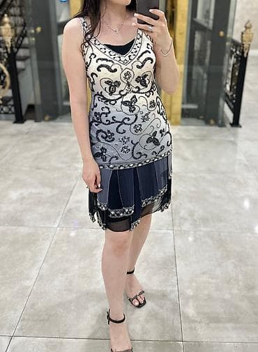 razrezli don: El ishlemesi 700 m alinib 36-40 olcu
Uzeri biserle ishlemedir — 1