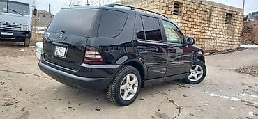 hunday diski: Mercedes-Benz ML 320: 3.2 l | 2001 il Ofrouder/SUV — 2