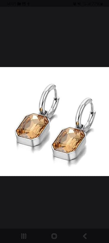 carter uzuk: Zərgərlik dəsti – gümüş rəngli metal üzərində kəhrəba tonlu kristallar — 2