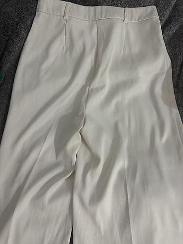 ag naftalan: Ağ rəngli klassik şalvar enli

Olcu xs-S
ic gostermir — 2