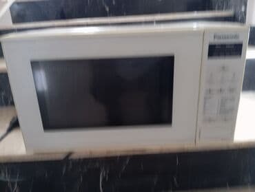 tum qovuran aparat: Mikrodalğalı soba Panasonic satılır tam işlək vəziyyətdə yenisini — 7