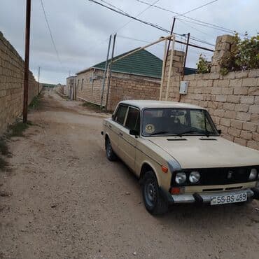 тап аз автомобили: VAZ 2106 sedan - Kuzov: bej rəng, 4 qapı, xrom yan moldinqlər — 3