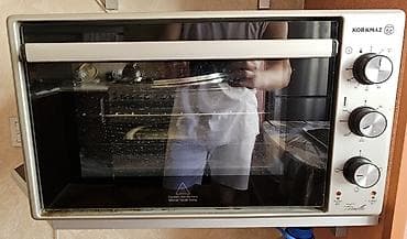 corek sobası: Korkmaz elektrikli mini soba - Kompakt stolüstü dizayn, gümüş rəngli — 1