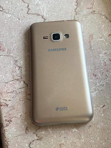 Samsung Galaxy J1, rəng - Qızılı — 3