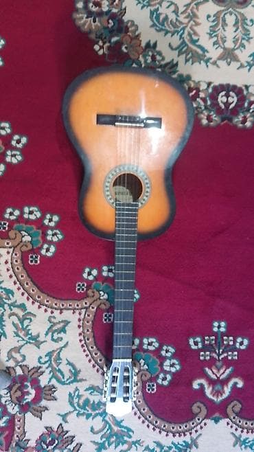 Гитары: Klassik akustik gitara - Korpus: klassik formasında, günəş burst — 1