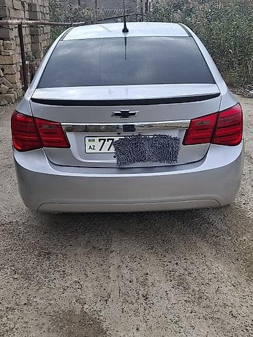kia optima diffuser: Chevrolet Cruze: 1.4 l | 2014 il 200000 km Sedan — 2