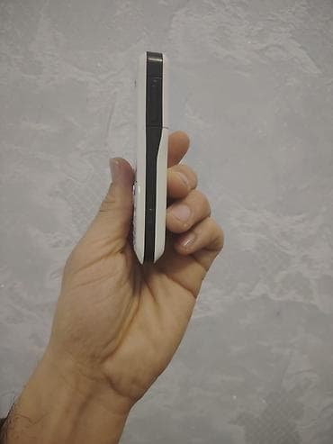 salyan telefon: Nokia 110 4G, 128 GB, rəng - Ağ, Barmaq izi, İki sim kartlı — 5