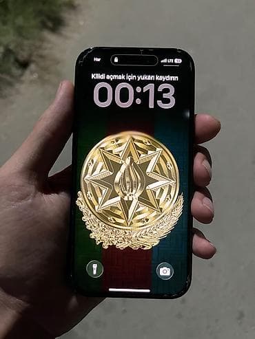 apple m1: IPhone 15, 128 GB, Qara, Face ID — 1