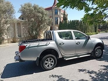 Mitsubishi: Mitsubishi L200: 2.5 л | 2011 г. Пикап — 4
