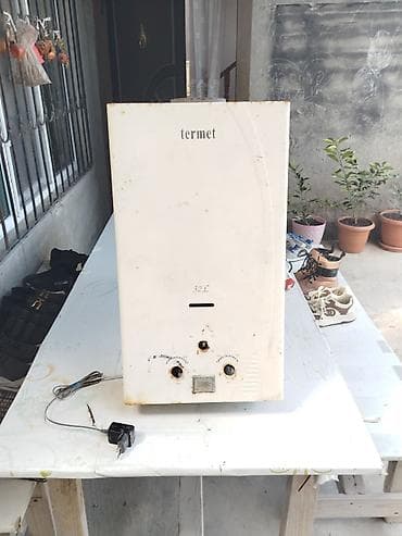 Su qızdırıcı hər bir şeyi işlək vəziyyətdədi adaptörü da