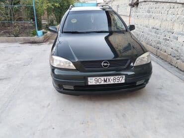 ремонт сидений авто: Opel Astra Caravan (universal) – tünd yaşıl rəng • Kuzov: universal — 4