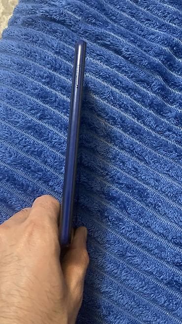 telefon ucun printer: Smartfon – ekranda damla tipli ön kamera çıxıntısı olan, maviyə çalan — 4