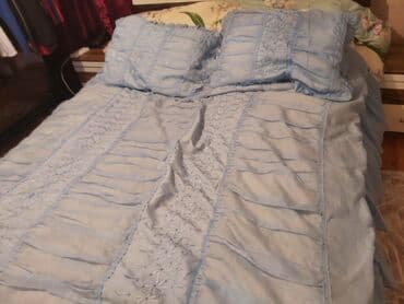 Prosvali mavi rengde pokrival ve 2 balis uzu olqn dest, teze kimidir — 1