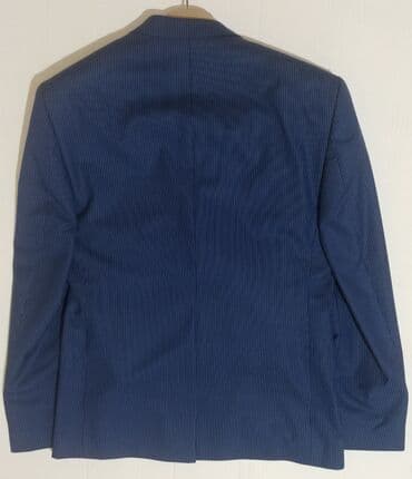 Kostyum 48 ölçü Tünd göy rəngdə Cəmi 2 dəfə geyinilib,yəni yenidən — 2