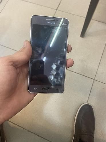 сот телефон fly: Samsung Galaxy J2 Prime, цвет - Серый, Две SIM карты — 1