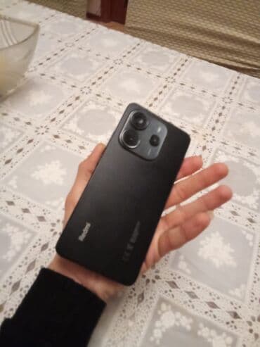 redmi 5 a: Redmi Note 14, 256 GB, rəng - Qara, Barmaq izi — 7