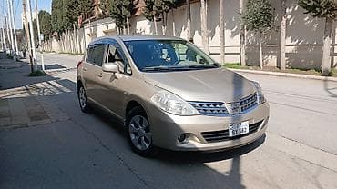 tra: Nissan Tiida hatchback - Kuzov: 5 qapılı hatchback, qızılı/bej rəng - — 7