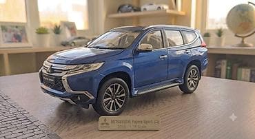 oyuncag masin: Mitsubishi Pajero Sport 2018 modelinin 1:18 miqyaslı kolleksiya — 1