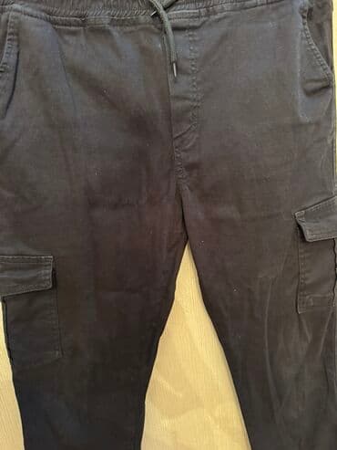 idman kişi şortları: Qara rəngli kişi karqo şalvarı - Model: karqo/jogger hibrid - Parça — 1