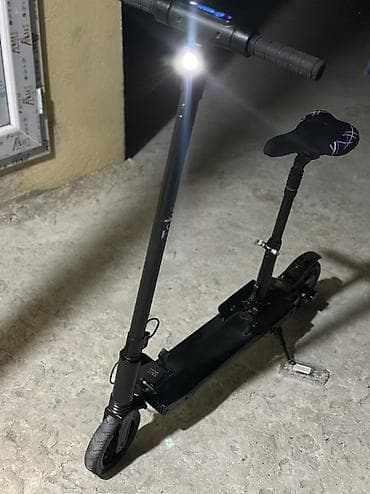 Hər şey işləkdi təcili satlır Elektrik skuteri – oturacaqlı, qara — 1