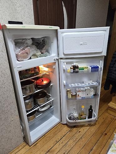 a 31: İki qapılı soyuducu – üstdə dondurucu, altda soyuducu bölmə — 4