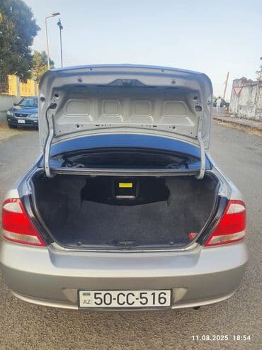 motosiklet telefon tutucu: Nissan Sunny: 1.6 l | 2008 il Sedan — 8