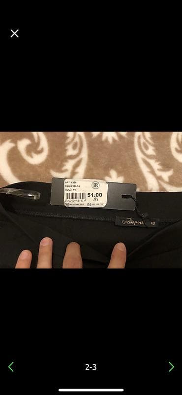 Qara yubka. 51 azn alınıb. Tezedi heç geyinilmeyib. Razmeri 40 — 2